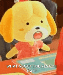 a stuffed animal is sitting at a table with its mouth open and the words `` what about the rest of yall '' .