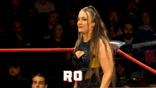 a woman in a wrestling ring with the name allysin kay on the screen