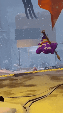 a purple monster with a hat and a broom is flying in the air