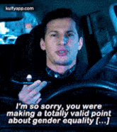 a man is driving a car and talking about gender equality