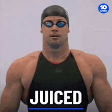 a man in a swimming suit with the word juiced on the top