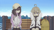 two anime girls are sitting on a bench with a yellow backpack