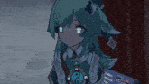 a girl with green hair is wearing a pendant with a yin yang symbol on it