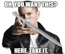 a man in a leather jacket is pointing at something with the words oh you want this here take it written below him