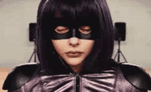 hit girl stare masked