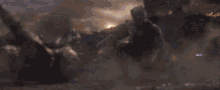 a man is running in the air with a lightning bolt on his back while another man is laying on the ground .