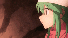 a girl with green hair and a white hat looks to the side
