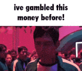 a man is standing in front of a crowd and says i 've gambled this money before !