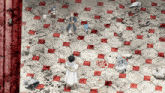 a group of anime characters are standing on a checkered floor