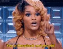 a woman is giving a throwback and you old speech .