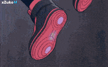 a person 's feet are glowing in the dark with a logo for xzuko in the corner
