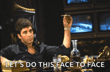 a man sitting in a chair holding a cigar with the words let 's do this face to face written below him