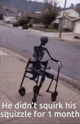 a skeleton with a walker is walking down the sidewalk