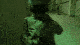 a group of soldiers are walking through a building