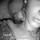 a black and white photo of a man and woman kissing .