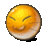 a close up of a yellow smiley face with its eyes closed .