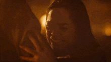 a woman with green nails is crying while a man holds her