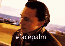 a close up of a man 's face with #facepalm written on the bottom right