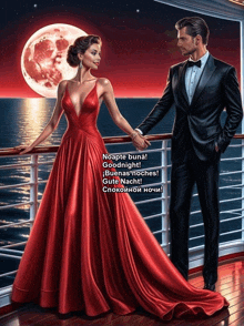 a woman in a red dress stands next to a man in a suit on a balcony