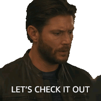 a man in a leather jacket says let 's check it out on a white background