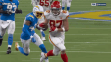 a football player with the number 87 on his jersey