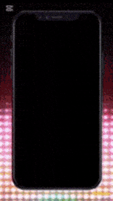 a cell phone with a glowing heart on its screen