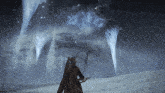 a person standing in a snowy field with a sword in their hand looking up at a cloudy sky