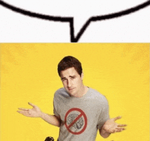a man wearing a no brain t-shirt is shrugging his shoulders and making a funny face .