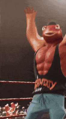 a frog wearing a shirt that says sweaty goon