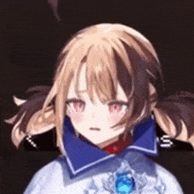 a close up of a girl 's face with a blue necklace around her neck .
