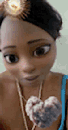 a woman wearing a necklace with a heart shaped pendant is looking at the camera .