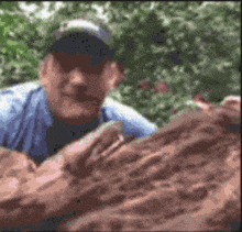 a blurry picture of a man wearing a hat and sunglasses