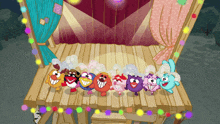 a bunch of cartoon characters standing on a stage