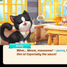 a black and white cat named kitty is sitting in a kitchen with its mouth open