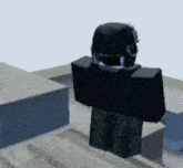 a roblox character is standing on a staircase wearing a helmet and headphones .
