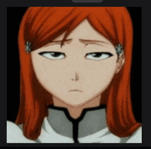 a close up of a girl with red hair