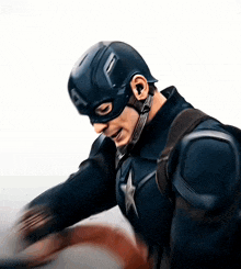 captain america is wearing a helmet that has the letter f on it