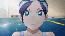 a girl with purple hair and blue eyes wearing a swim cap