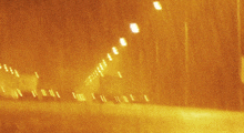 a blurry picture of a street at night