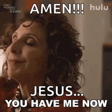 a woman with curly hair is saying amen jesus you have me now .