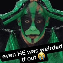 a picture of a man with green face paint and the caption even he was weird tf out