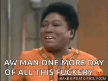 a woman is laughing and saying `` aw man one more day of all this fuckery `` .