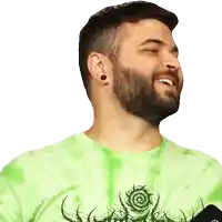 a man with a beard is wearing a green shirt