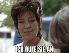 a woman is talking to another woman and the words ich rufe sie an are above her