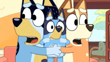 three cartoon dogs standing next to each other with one holding a baby