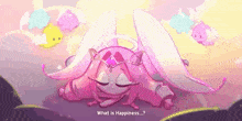 a pink cartoon character with wings and a crown is sleeping on the ground .