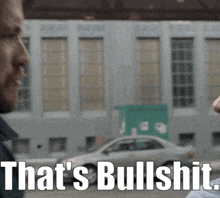 a man says " that 's bullshit " in front of a car