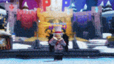 a person in a top hat and wings is standing in front of a castle .