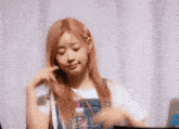a girl with pink hair is holding a bottle of water with the name oldman sunny on the bottom