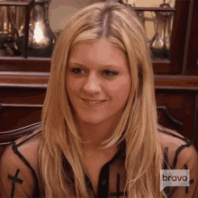 Awkward Smile Real Housewives Of New York GIF - Awkward Smile Real Housewives Of New York Pretending To Like It GIFs